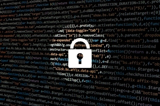 padlock over computer code background